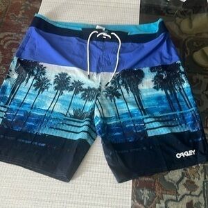 Oakley men’s trunks, size 40, blue , palm trees, blue & black